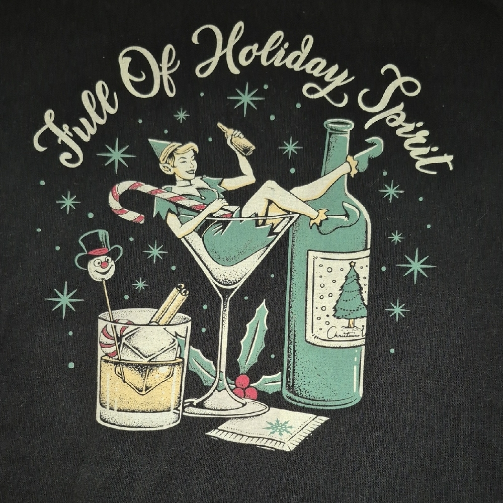 Torrid Black Tee with Festive Green and Cream Design